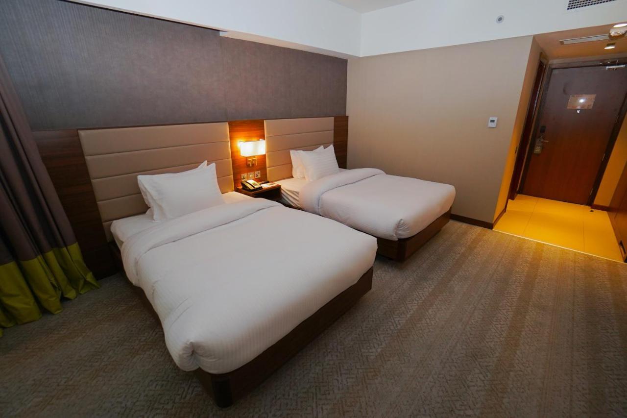 The Grand Lux Hotel Doha Eksteriør billede Deluxe room