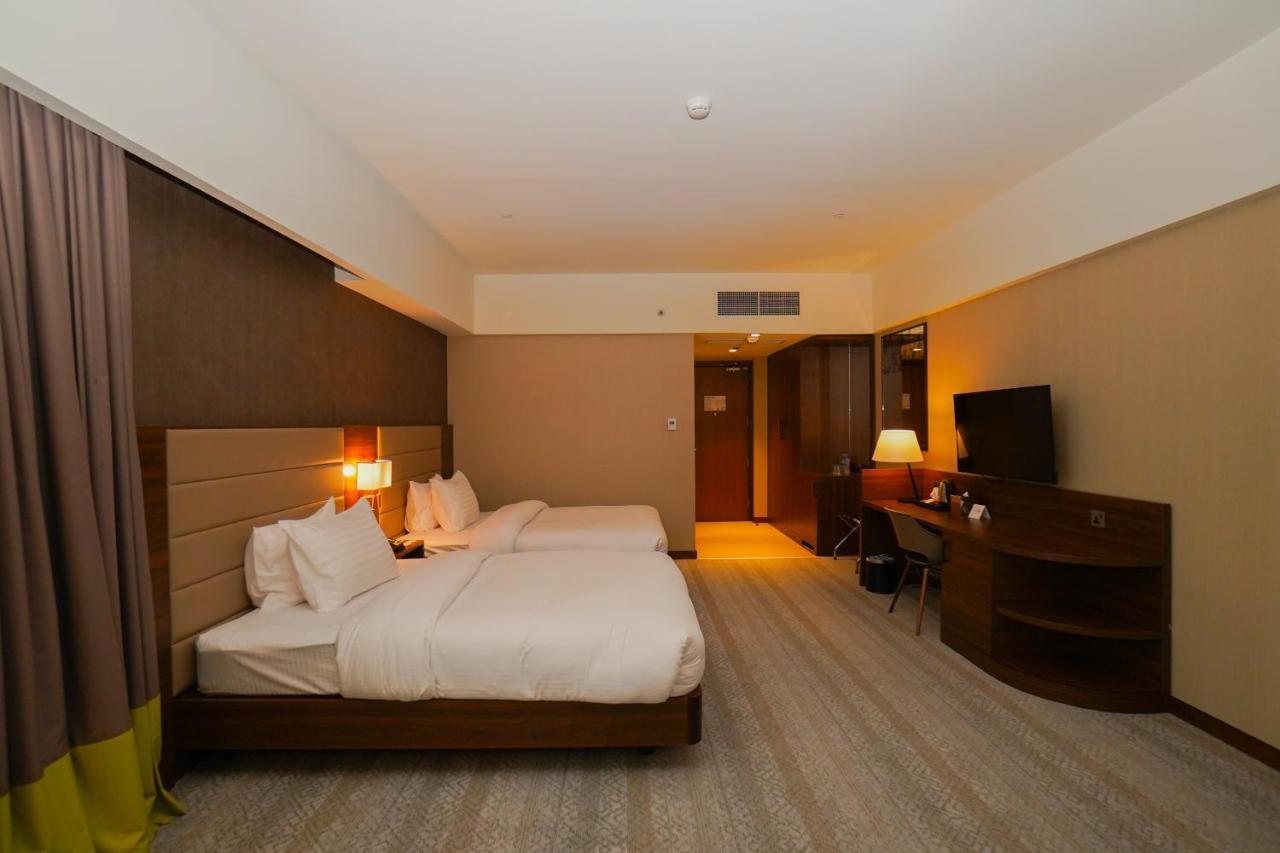The Grand Lux Hotel Doha Eksteriør billede Deluxe room